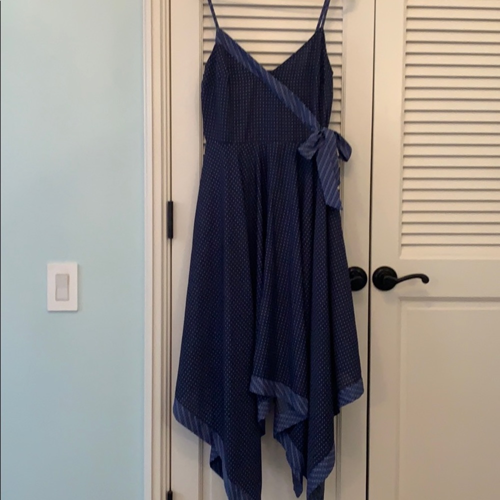 Flowy midi spaghetti strap dress with bow detail
